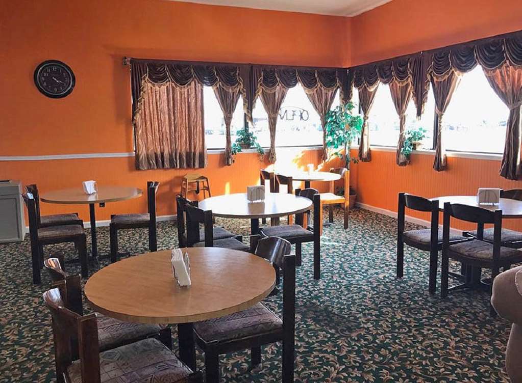 Asam Hotel Гудленд Ресторан фото
